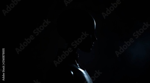 4K Dark silhouette of a humanoid AI robot assistant isolated against a black background, creating a futuristic and mysterious representation of artificial intelligence, robotics, automation