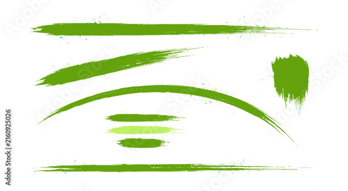 Set of green textured paint brush strokes and curved lines for artistic isolated on a white background
