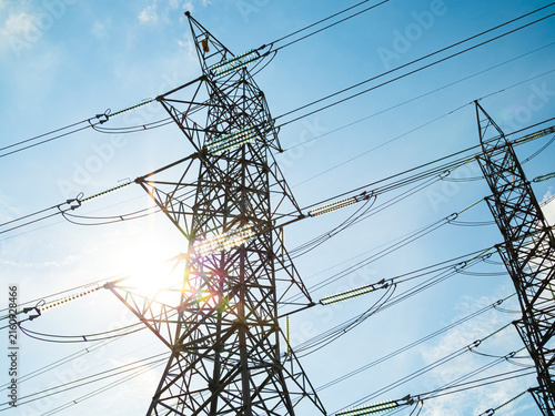 Quadro su tela High voltage electric pole power line electric transmission tower background, technology energy clean ecosystem change green environment, substation construction pylon generator grid electricity