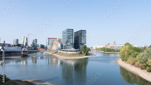 Urban Europe - Duesseldorf - Media Harbour Skyline with Waterfront Architecture while low Water in River Rhine