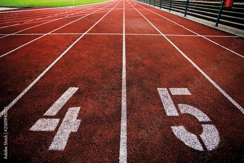Painted '4' and '5' on running track