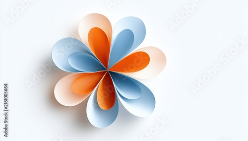 Delicate paper petals arranged in a circular bloom on a clean white surface