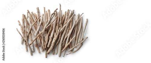 Dried Twigs Piled on a White Background with Natural Texture