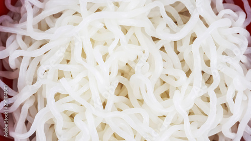 Macro Close-up Texture Background of Cooked White Shirataki Noodles