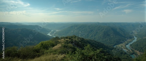 picturesque elevated landscape with deep valleys and winding river streams