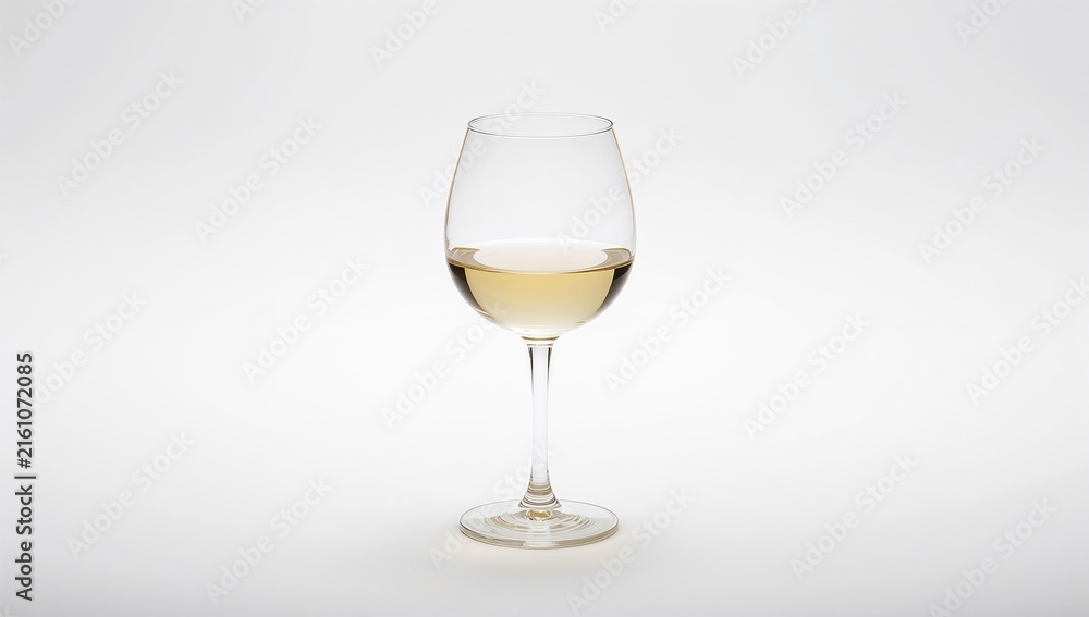 Fototapeta premium Elegant Wine Glass with White Wine Isolated on White Background