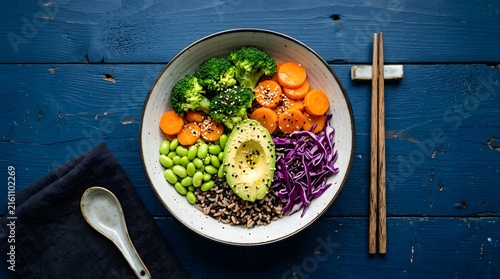 Healthy grain bowl with fresh vegetables and avocado