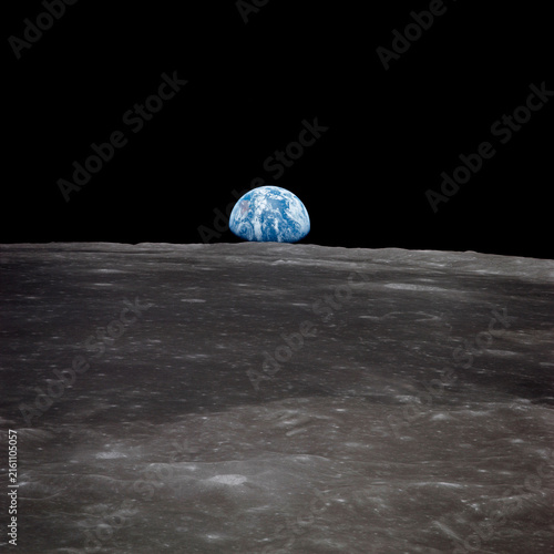 Quadro su tela View of Earth rising over Moon's horizon. Vintage poster