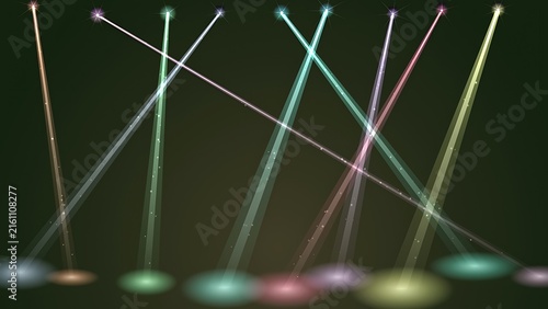 Colorful stage spotlights casting bright illumination and glowing light beams downward onto the floor against a dark background with spotlight lighting colorful background illumination nightclub