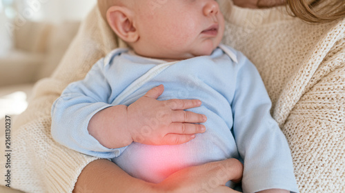 Infant with Stomach Discomfort Being Gently Held by Parent in Cozy Home