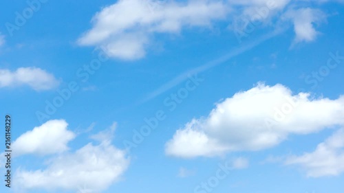 Blue sky with white light clouds in  foreground
