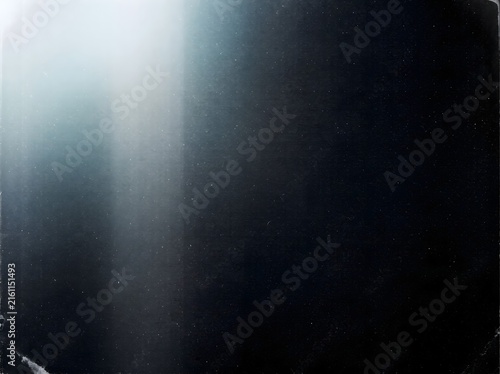Принти на полотні Dark abstract background with subtle light streaks and textured surface