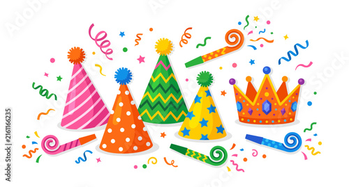 Colorful party hats and a royal crown with festive confetti and blowers isolated on a white background for birthday celebrations