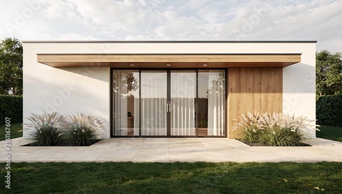 Modern Mediterranean Villa Exterior with Stone Wall and Manicured Lawn