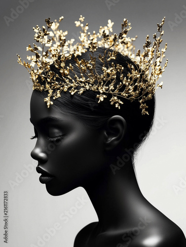 Elegant profile portrait of a beautiful Black woman with smooth dark skin wearing an intricate golden floral crown. Minimalist luxury fashion concept