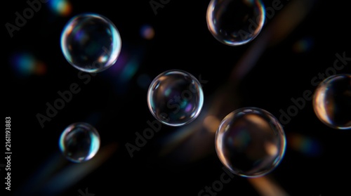 Floating Transparent Spheres with Ethereal Light Refractions on Dark Background