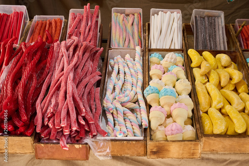 Colorful confectionery assortment offering sweet sugar treats at market stall