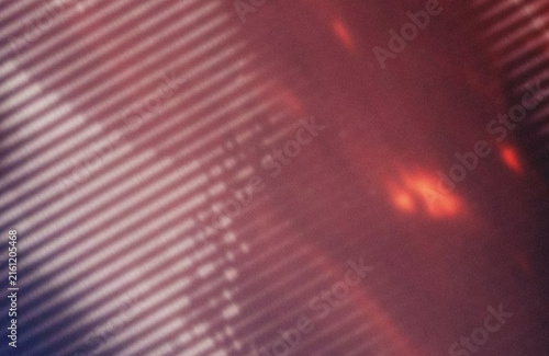 Foto Close-up of red glowing spots on textured surface