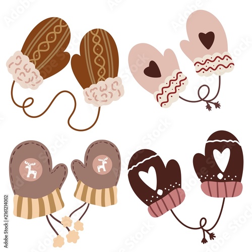 Fotografie Set of cozy winter mittens with hearts and nordic ornaments isolated on white ba