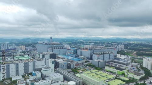 Aerial Drone View of Advanced Semiconductor Chip Manufacturing Plant and Industrial Complex in Icheon, South Korea