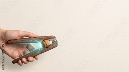 Person holding a small toothbrush to visualize negotiation leverage as small input creating mechanical advantage