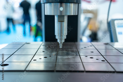 Industrial precision measurement device on worktable in workshop