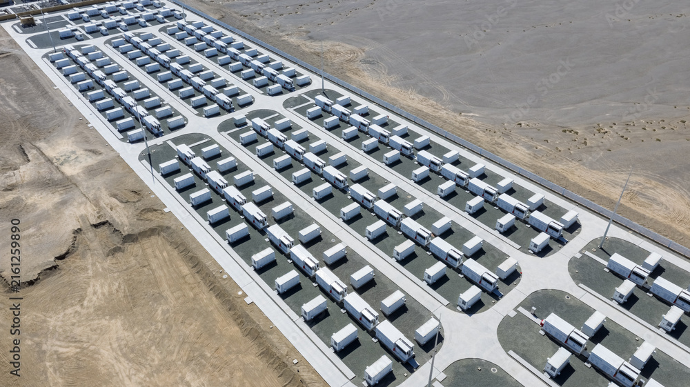 Fototapeta premium Aerial View of Massive Energy Storage Power Station in Desert Landscape