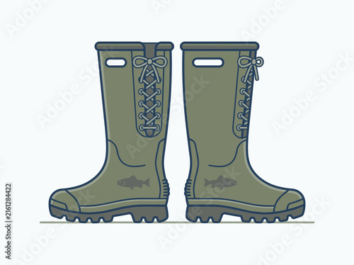Laced green rubber boots for outdoor fishing.