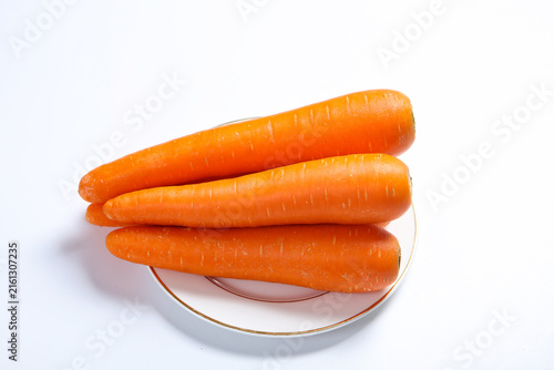 Quadro su tela Fresh raw carrot vegetable healthy food still life