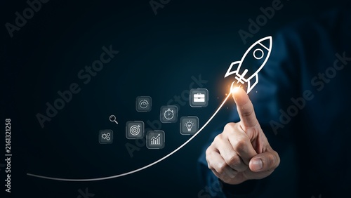 A finger touching a digital rocket ship icon, symbolizing business growth and startup success. The background is a dark blue gradient.