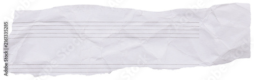 Strip of torn crumpled paper with empty musical staff fragment from music notebook, isolated element