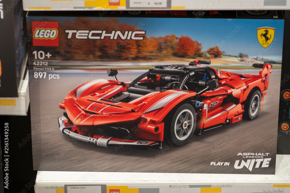 Fototapeta premium LEGO Technic Ferrari FXX K Red Racing Sports Car Building Blocks Model Toy Set Box on a Retail Shelf. Milan, Italy - June 24, 2026