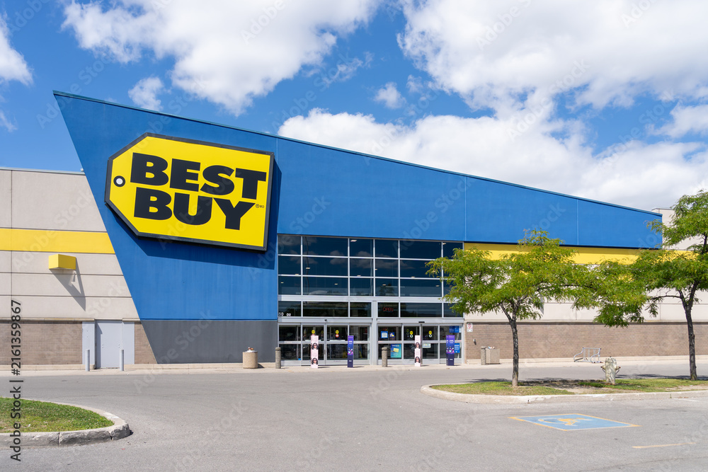 Fototapeta premium Toronto, ON, Canada - August 17, 2026: The exterior storefront of a Best Buy consumer electronics retail store in Toronto, ON, Canada. Best Buy is an American multinational consumer electronics retail