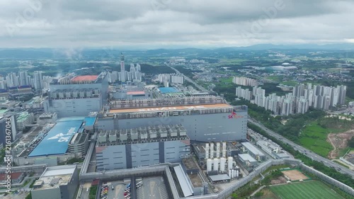 Aerial Drone View of Advanced Semiconductor Chip Manufacturing Plant and Industrial Complex in Icheon, South Korea