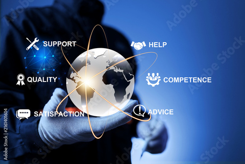service concept with technician's hand holding globe represent international technical support and customer services by global company