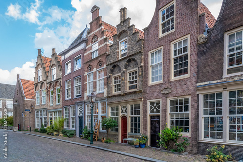 This historic street scene shows Hofstraat in Dordrecht, known for its characteristic stepped gables and monumental buildings