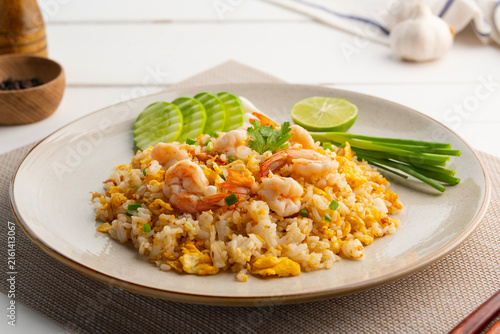 Fried Rice with Shrimps in white plate.Thai food.(Kao Pad Kung)