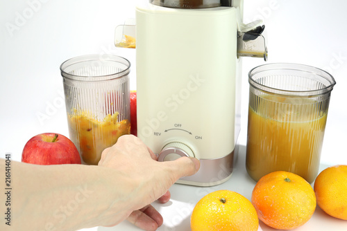 Foto Modern juicer or juice extractor for juice or slow juice for extracting fresh fr