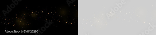 Foto Scattered soft golden particles with glow on transparent background and black sp