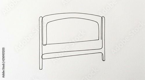Simple outline of a bed headboard in minimalist style  