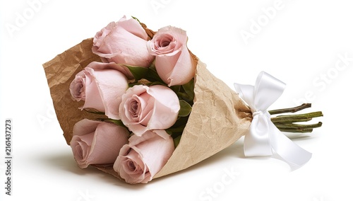 A Delicate Bouquet of Soft Pink Roses Tied with a White Ribbon.