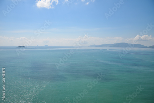 NHA TRANG, VIETNAM – MAY 10, 2026: Turquoise waters of the South China Sea with distant mountains along the northern coast of Nha Trang.