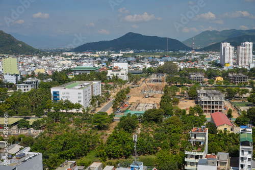 NHA TRANG, VIETNAM – MAY 10, 2026: Aerial view of residential neighborhoods with colorful houses and rooftops in Nha Trang, Khanh Hoa Province.