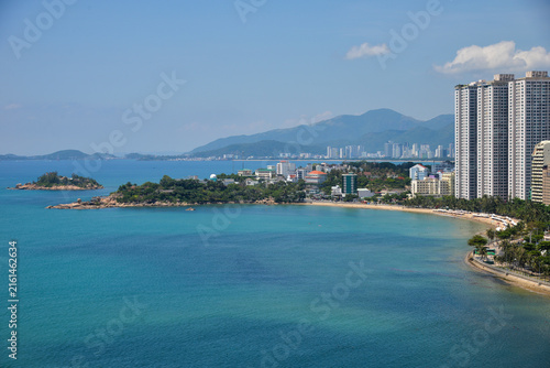 NHA TRANG, VIETNAM – MAY 10, 2026: Aerial view of North Nha Trang coastline with Nha Trang Bay, beachfront road, buildings and mountains.