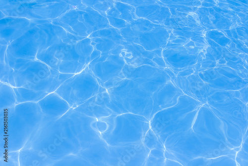 The light reflects blue in the water in the swimming pool. It looks fresh and lively, suitable for use as a wallpaper.