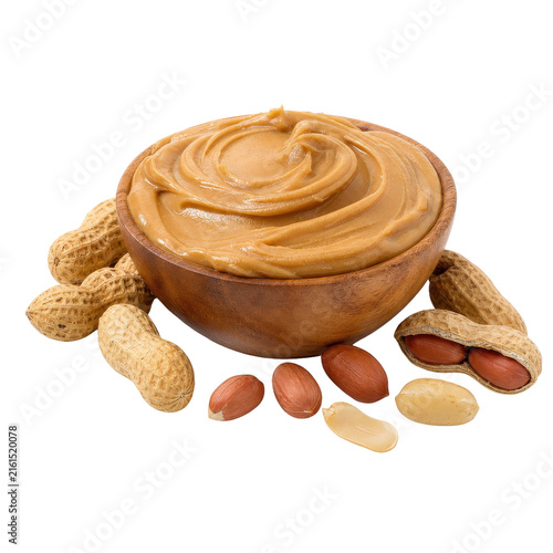 Fotografía Smooth creamy peanut butter in a wooden bowl surrounded by whole and shelled pea