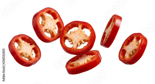 Foto Levitating red hot chili pepper ring slices