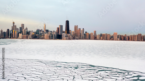 Chicago skyline beyond frozen Lake Michigan in winter