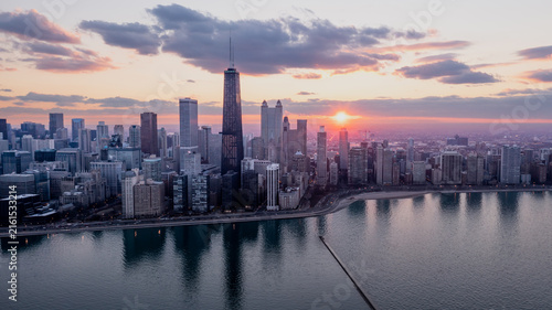 Chicago skyline under a dramatic pink sunset sky
