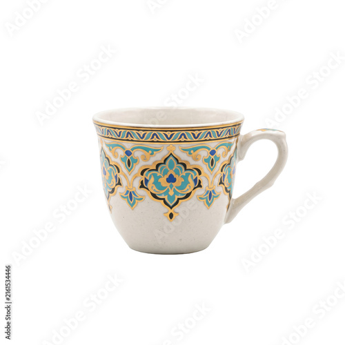 Fotografie Elegant ceramic cup with intricate gold and turquoise Middle Eastern inspired pa
